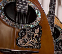 Bouzouki’s evolution from 3 to 4 strings